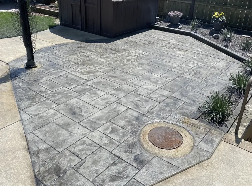 Stamped concrete patio with fire pit in Tulsa, Oklahoma
